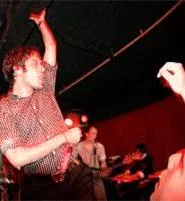 Buttoned down, but not bottled up: Daryl Palumbo raises the roof.