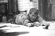Cary Elwes stars in Saw, the most brutal - movie youll see this year.
