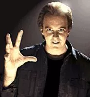Charles Band's big creepy hand is almost as scary as the demonic dolls and puppets that populate his movies.