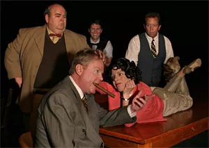 Comedy Central: John J. Polk (bottom left), Rachel Spence, and company.