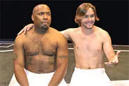 Darren (Michael May) and pal Kippy (Phil Carroll) share a buff moment in Take Me Out.
