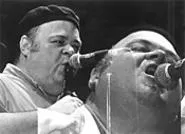 David Thomas, blowing into his Budweiser at the - Beachland on June 5. - WALTER NOVAK