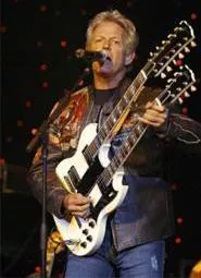 Don Felder and his doubleneck guitar set the tone at the Rock Hall benefit Friday, May 12. - ROLL HALL OF FAME