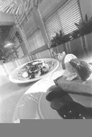 Epicures can enjoy an equatorial experience at the Thirsty Parrot. - WALTER NOVAK