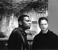 Gary Sinise (right) stars as a weapons designer -- or a weapon.