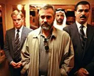 George Clooney (center) plays a failed CIA assassin surrounded by corruption.