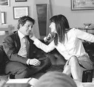 Grant and Bullock are likable leads playing out an - all-too-predictable story.