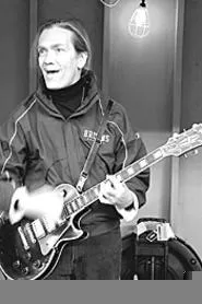 Hey, wasn't he in Spider-Man? G.E. Smith, looking a - lot like Willem DaFoe.