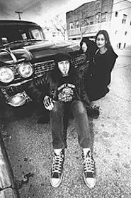 His "n' Hearse: Eddie and Natalie Wille, owners of B-ware Video. - WALTER NOVAK