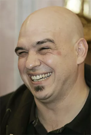 Iron Chef Michael Symon's photogenic smile shone positive light on C-Town's food scene. - AP PHOTO/TONY DEJAK
