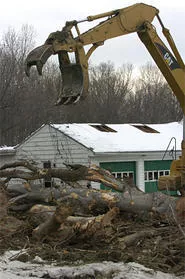It takes a backhoe 45 minutes to turn a home into scrap. - WALTER NOVAK