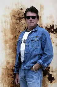Joe Ely has perfected the look of your everyday barroom guy.