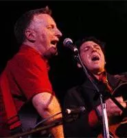 Joe Henry and Billy Bragg trade verses of Dylan's "Girl From the North Country" and Van Morrison's "Tupelo Honey" during a festival-capping free-for-all. - MATT NORRIS