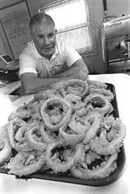 Joe Orange, with a large order of Bearden's wonderful beer-battered onion - rings. - WALTER NOVAK