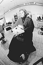 LaDosha Wright calls herself a hair stylist, but the - better term would be "hair therapist." - WALTER NOVAK