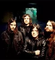 Long hair? Leather? Headbanging? Priestess checks out.