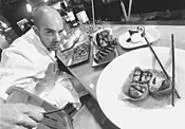 Michael Herschman prefers a chef's knife to a hatchet. - WALTER NOVAK