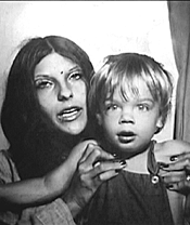Mother and son, in their own worlds.