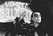 Nikola Ristanovski, doing his best Joel Grey.