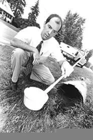 O death, where is thy sting? Joe Lynch dips for mosquitoes. - WALTER NOVAK