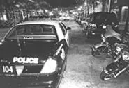 On West Sixth Street, cops can be easier to spot than - taxis. - WALTER NOVAK