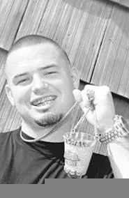 Paul Wall flashes his $25,000 smile. - DANIEL KRAMER