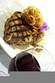 Porterhouse pork chop, honey-truffle glaze: Don't even think of sharing. - WALTER NOVAK