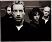 Sadder than Jesus: Even Gwyneth's love can't save Coldplay's Chris Martin (foreground).