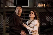 Sandra Bullock and Julian McMahon share a foreboding moment.