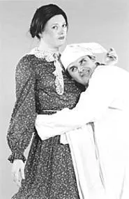 Scrooge seeks a little lovin' from Mrs. Bob Cratchit.