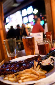 Simple, sauced 'n' slathered fare hits a home run with most sports fans. - EARTHA GOODWIN