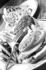Spectacular burgers top a long list of midday favorites at the Little Bar. - WALTER NOVAK