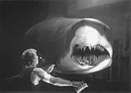 Surf 'n' turf: A shark hogs the screen with co-star Thomas Jane.