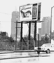 Tape up or ship out: Eller Media says the city's crackdown on torn billboards is political retaliation. - WALTER NOVAK