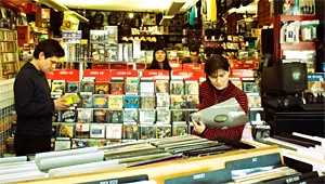 The Breeders try to track down a cheap used copy of Surfer Rosa for the road.
