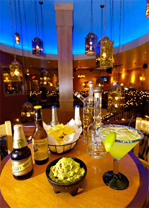 The chips are down and ready to dip in a citrusy guacamole chased by a Mexican cooler. - WALTER NOVAK