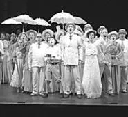 The Ragtime cast lift their voices in song.