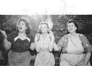 Three Italian American housewives keep the home - fires burning during the wartime summer of 1945.