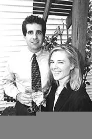 Toastmasters Brian and Cathy Kingsley raise a glass to good diction. - WALTER NOVAK