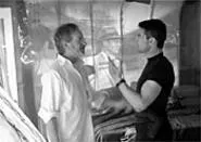 Tom Cruise and Steven Spielberg have a close encounter (oh, so ugh) on the set of Minority Report. - DAVID JAMES