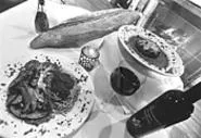 Two reasons to visit Vetturini's: Sausage-stuffed - mushrooms and Veal Saltimbocca. - WALTER NOVAK