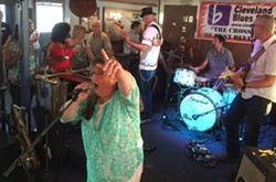 Becky Boyd takes the mic during the Blues Cruise on July 11. - ERIC SANDY