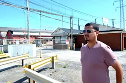 Councilman Angel Arroyo outside Republic Steel - PHOTO BY ERIC SANDY