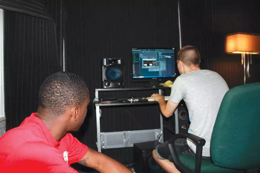 Tezo and Nate Fox in a home studio in 2007.