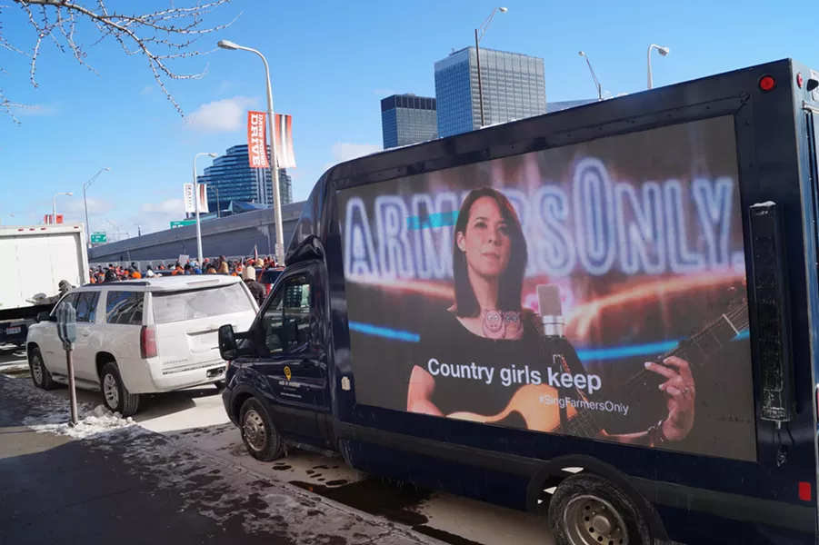 The roving billboard at the perfect season Browns parade. - PHOTO BY SAM ALLARD