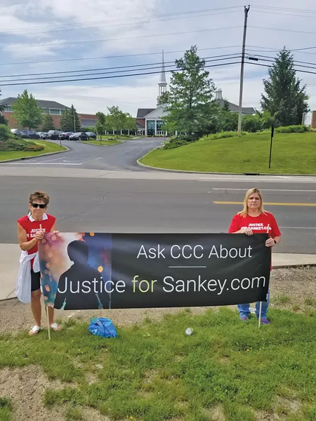 Cari Gintz and Sarah Klingler outside Christ Community Chapel in June. - PHOTO COURTESY SARAH KLINGLER