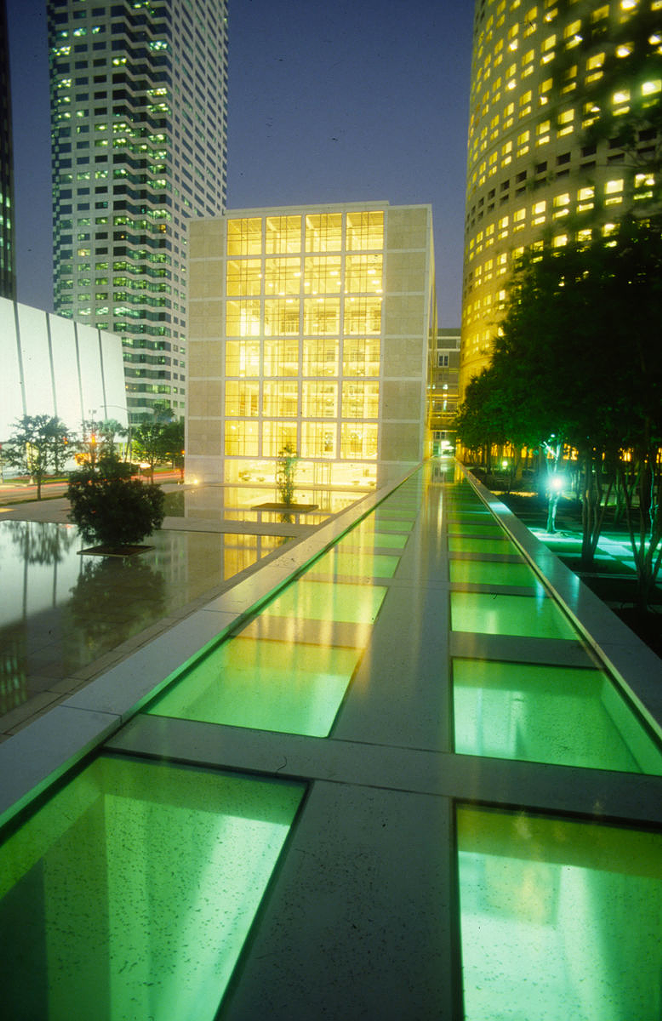 The original garden had water features in which circular basins fed into nine narrow concrete runnels, culminating at a 400-foot-long plexiglass bottomed canal. - C/O HARRY WOLF