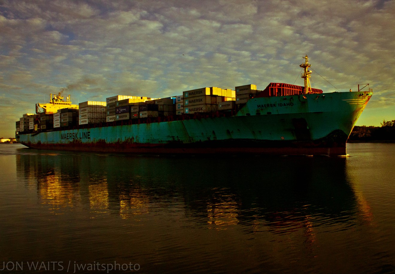 A ship stacked with containers only highlights the eerie beauty of the lower Savannah River.