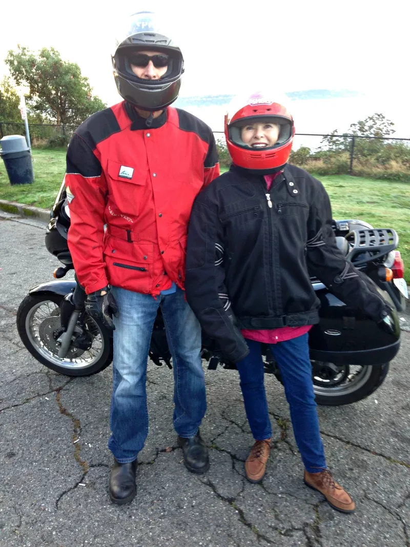 Finding joy can mean stepping out of your comfort zone and trying something new. Jan McIntire suits up for her first motorcycle ride on the winding streets of Seattle with son Dave.