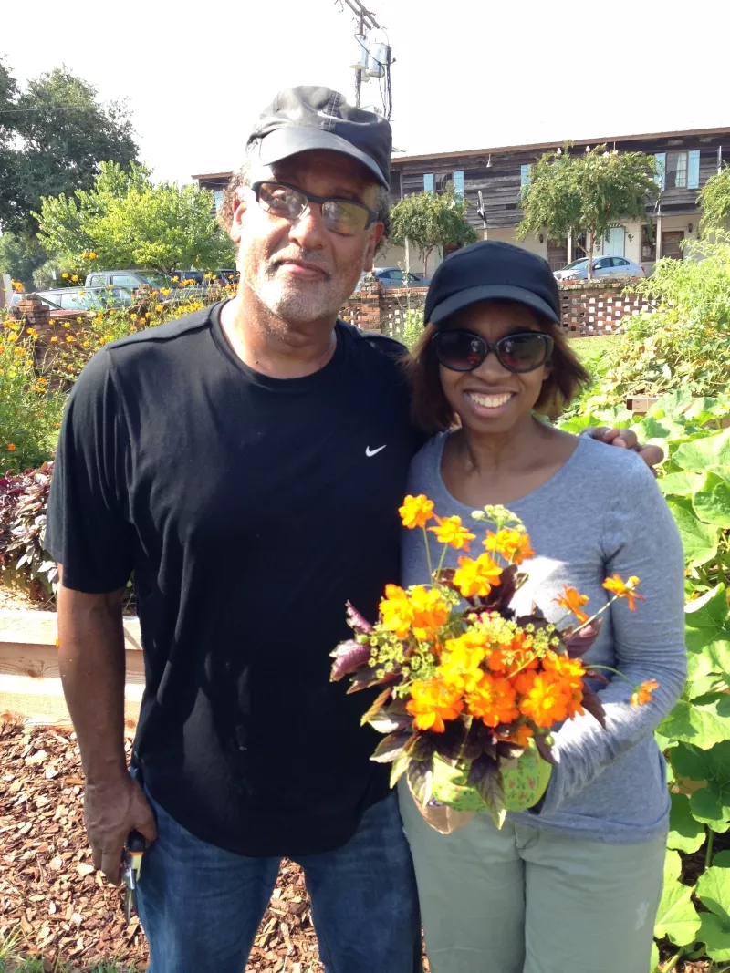 Master Gardener Kenneth Denny and Anne Roise, Savannah educator and civic leader, gather a garden bounty bouquet. They are Savannah residents who regularly volunteer at the CRI Healthy Garden at Trustees' Garden. Photo by Chuck Palm, © Canyon Ranch Institute.